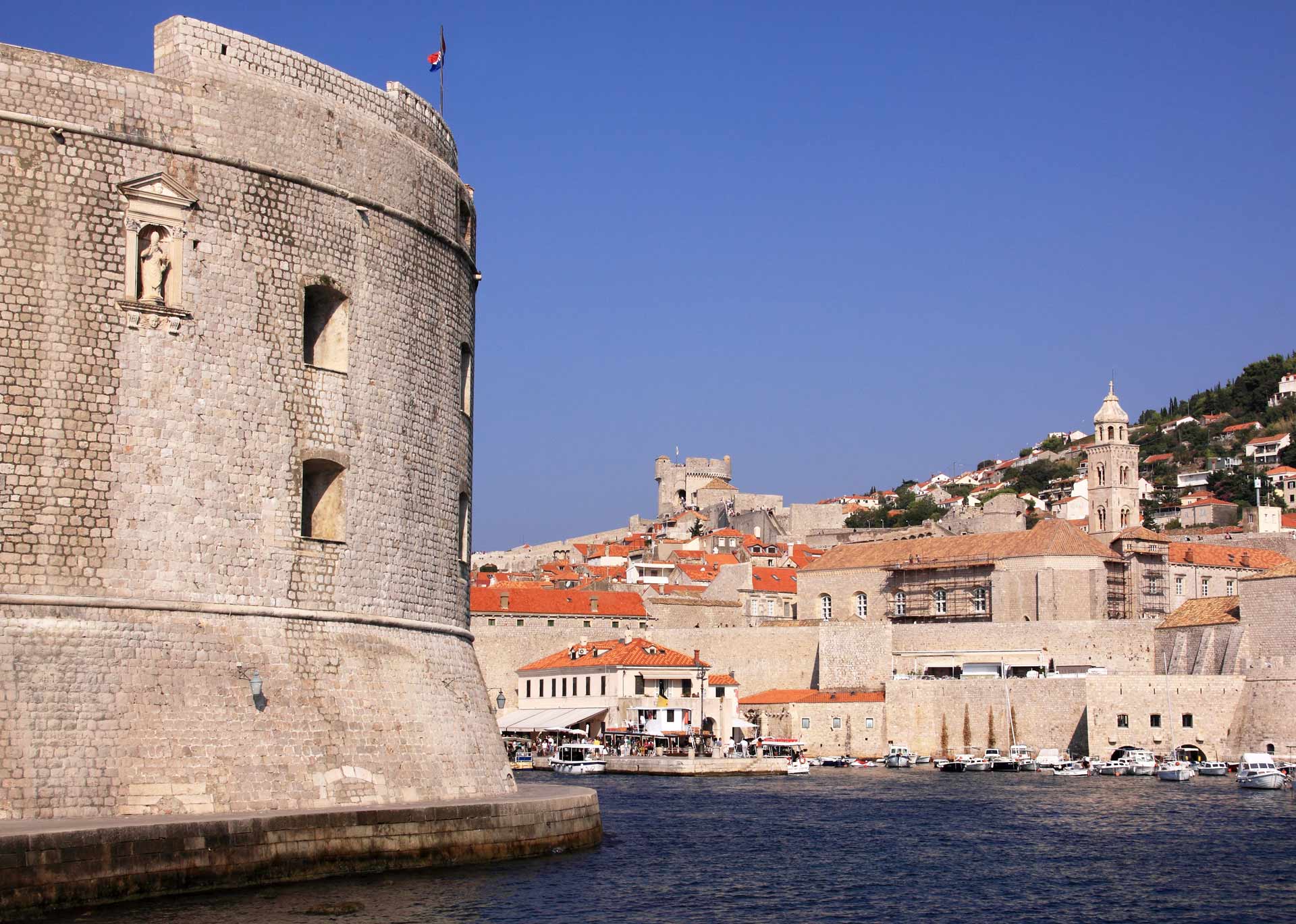 Croatia Dubrovnik Harbor and historical center UNESCO World Heritage Site restored after being damaged by heavy bombardments in the Balkan war